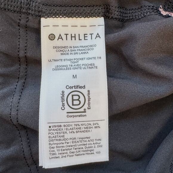 Athleta Ultimate Stash Pocket Ignite 7/8 Tight Legging, Black & Pink, Medium - Picture 9 of 10